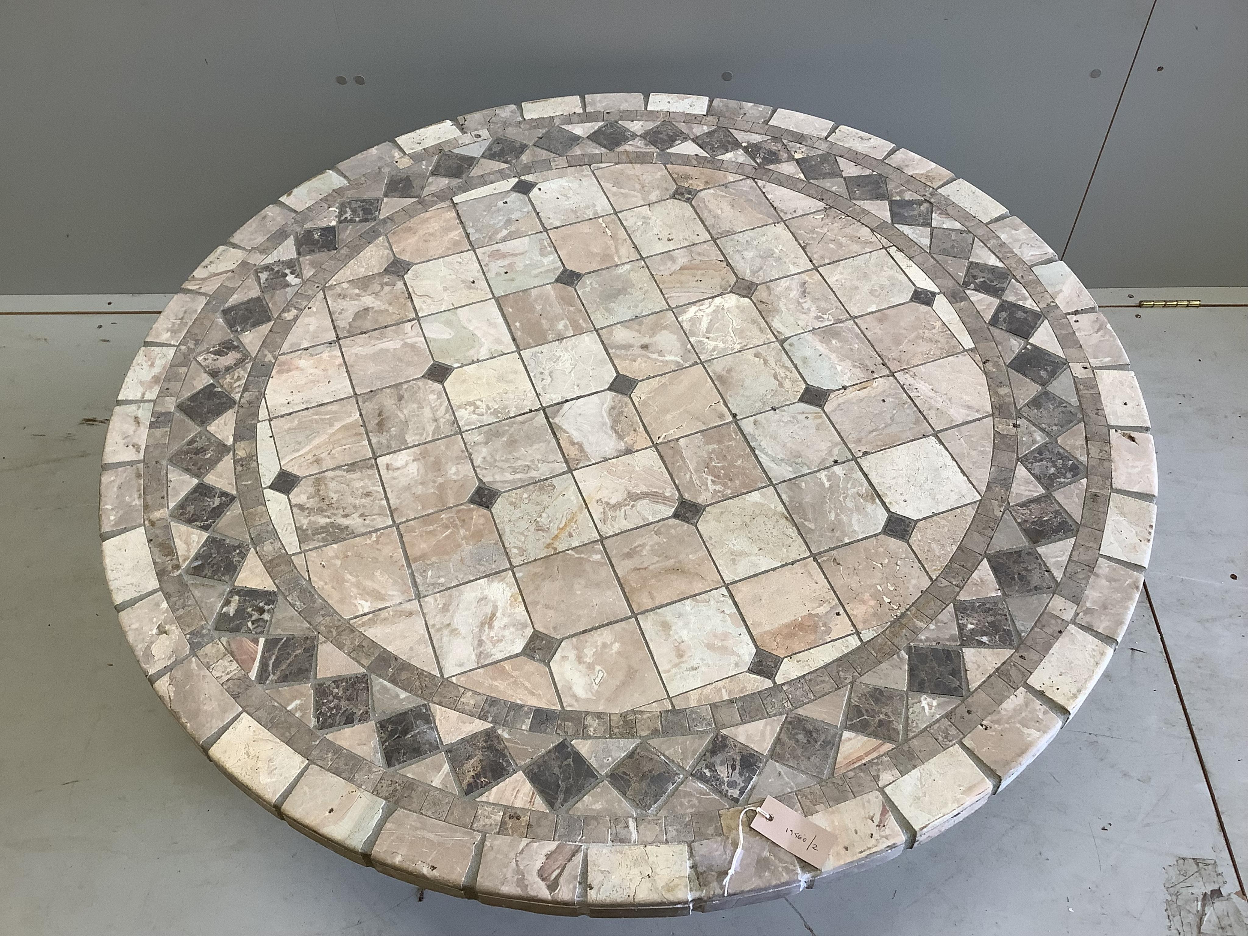 A hardstone mosaic top coffee table with reconstituted stone base, diameter 121cm, height 47cm. Condition - fair
